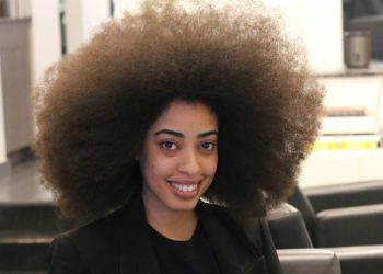 NY Woman Breaks World Record with Afro Measuring Nearly 5 Feet Around
