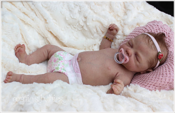 real life baby dolls that cry and move and breath